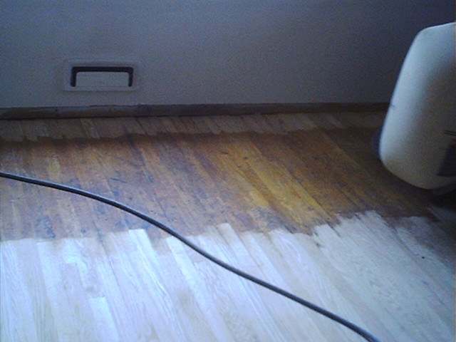 The floor in the middle of sanding...