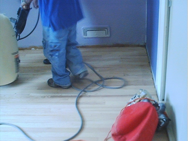 Sanding the floor