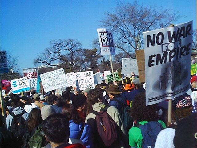 General shot of protesters and their signs